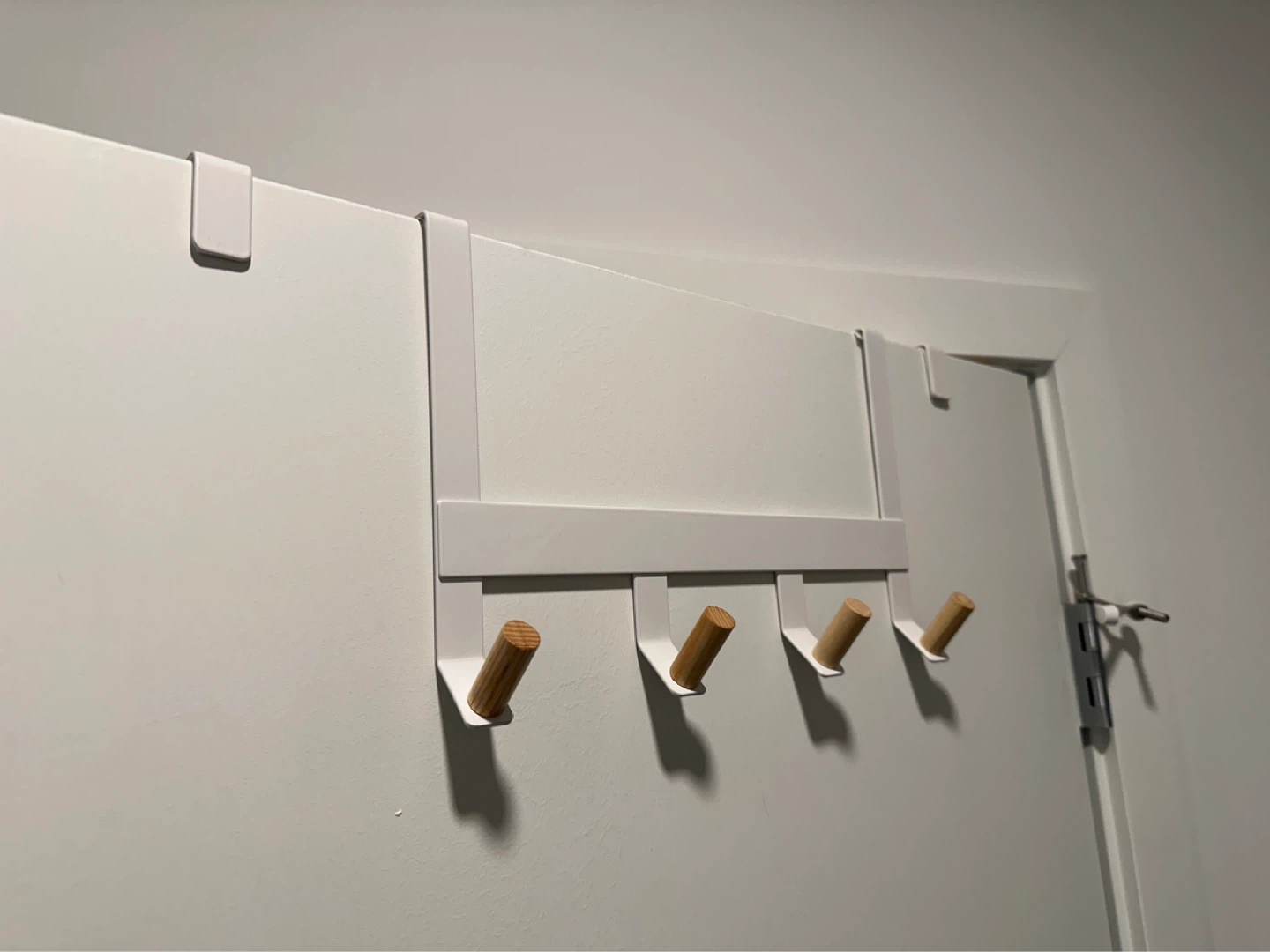 White Over-the-Door 4 and 6-Hook Rack with Wood Pegs