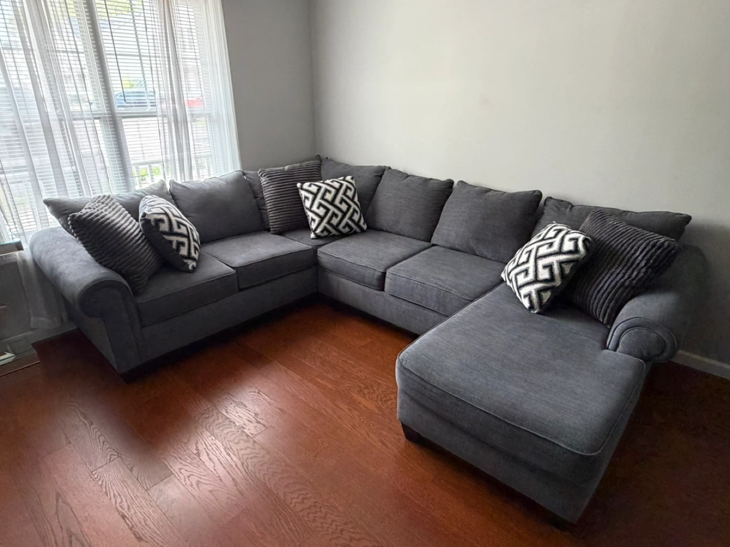 Gray Sectional Sofa with Chaise and Accent Pillows