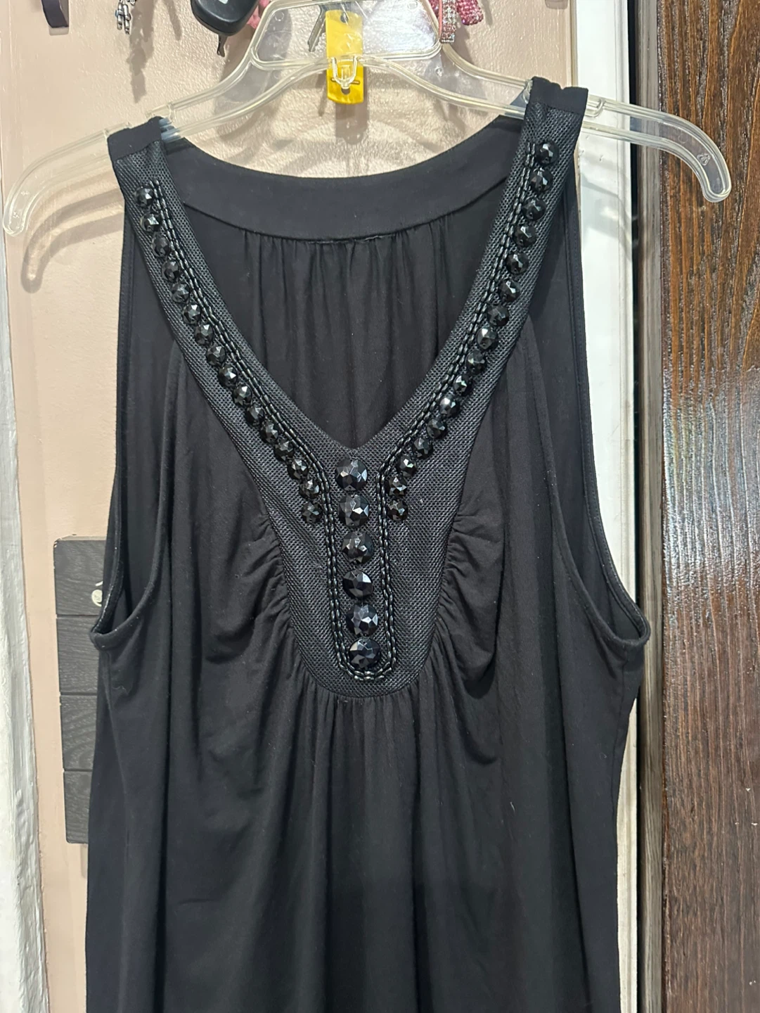 Black sleeveless embellished V-neck top - photo 2
