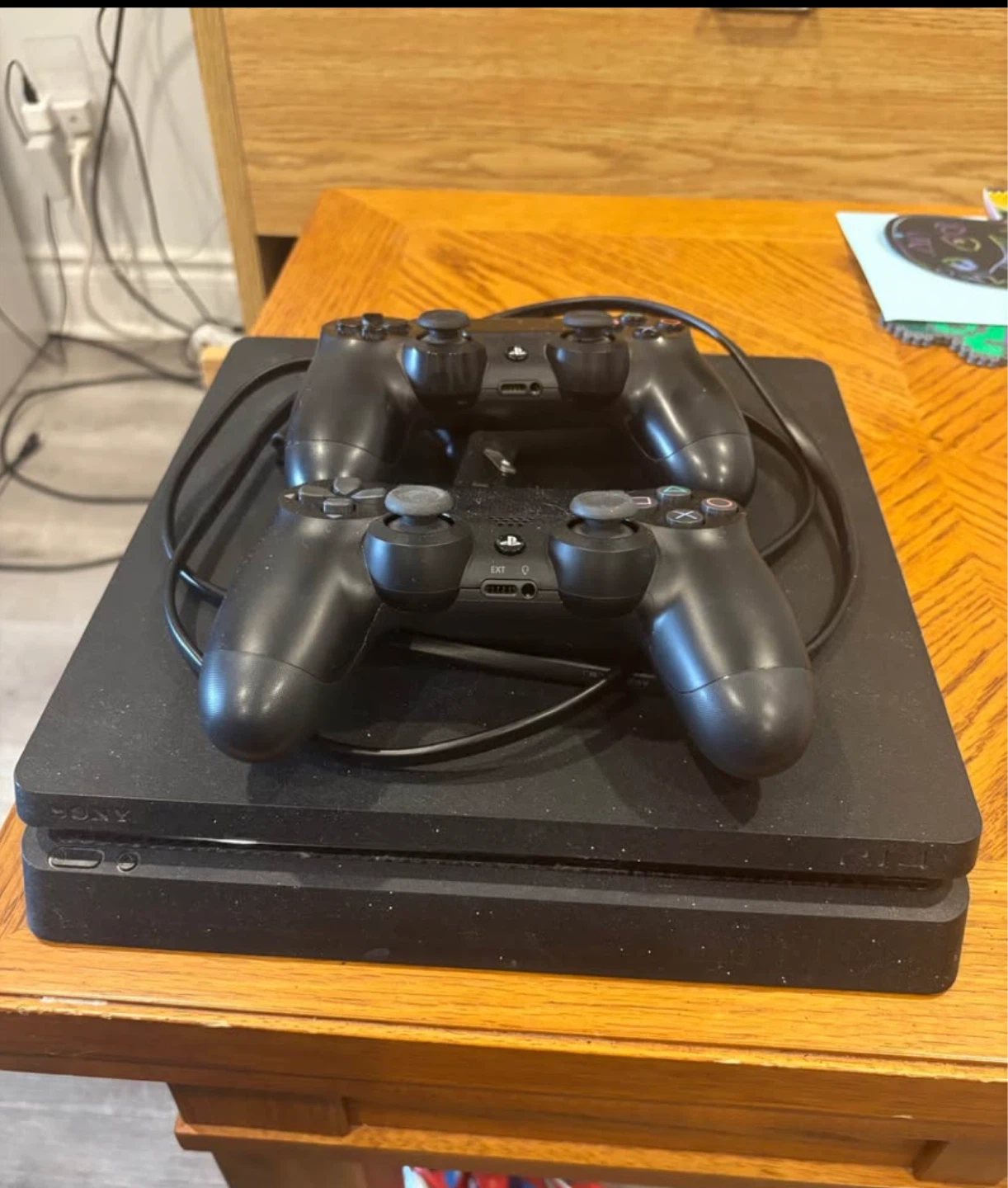 PlayStation 4 Slim Console with 11 Games and 2 Controllers - photo 2