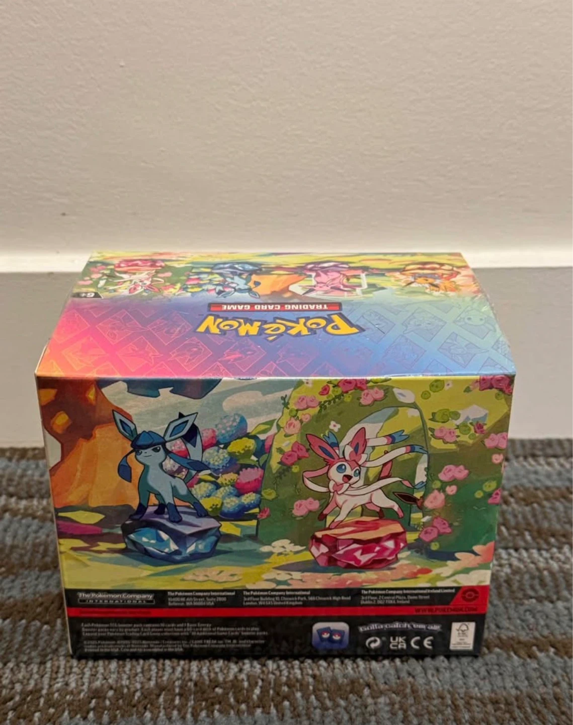 Pokémon prismatic evolutions mini tins display