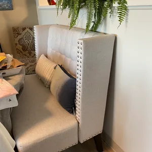 Cream Upholstered Wingback Banquette Bench