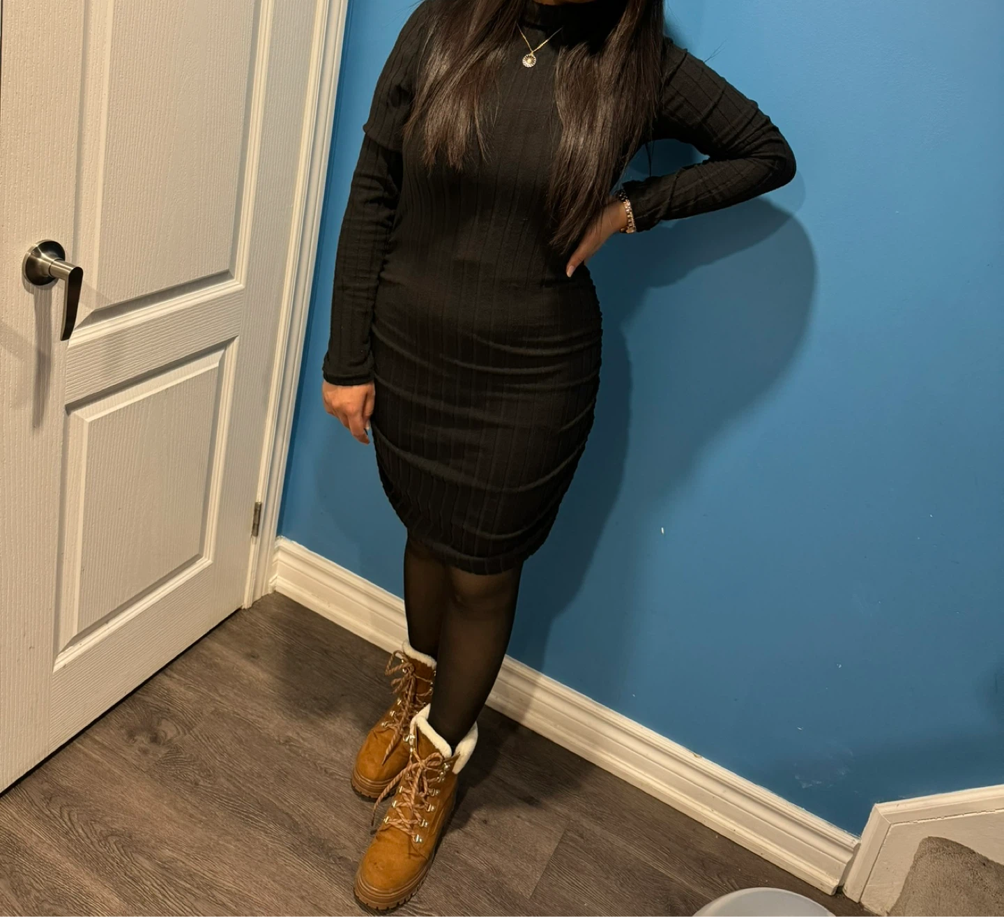 Black Ribbed Turtleneck Dress with Ruched Detailing