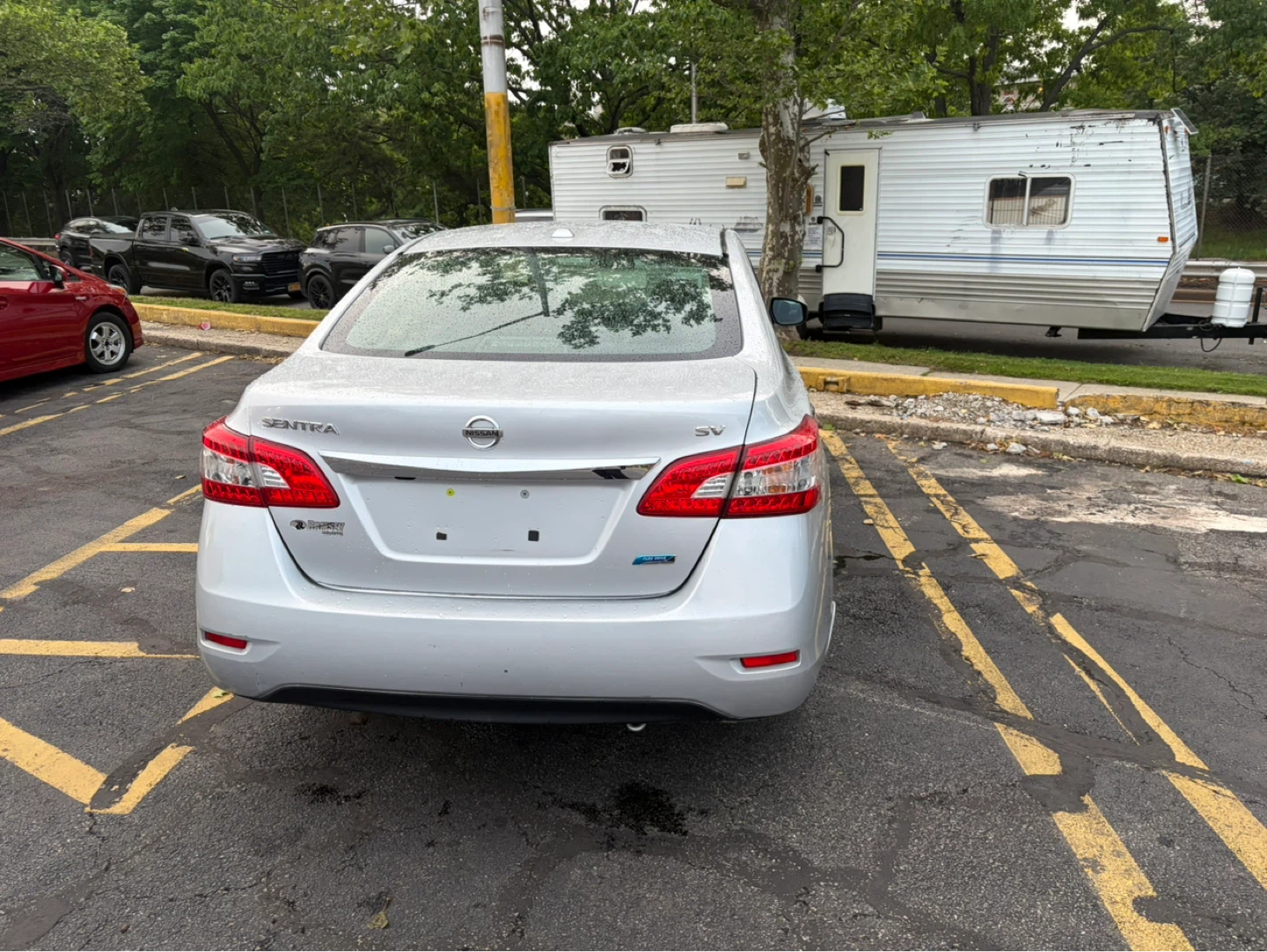 Silver Nissan Sentra SV Sedan