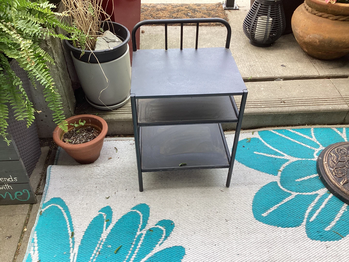 Small black metal shelf unit - photo 2