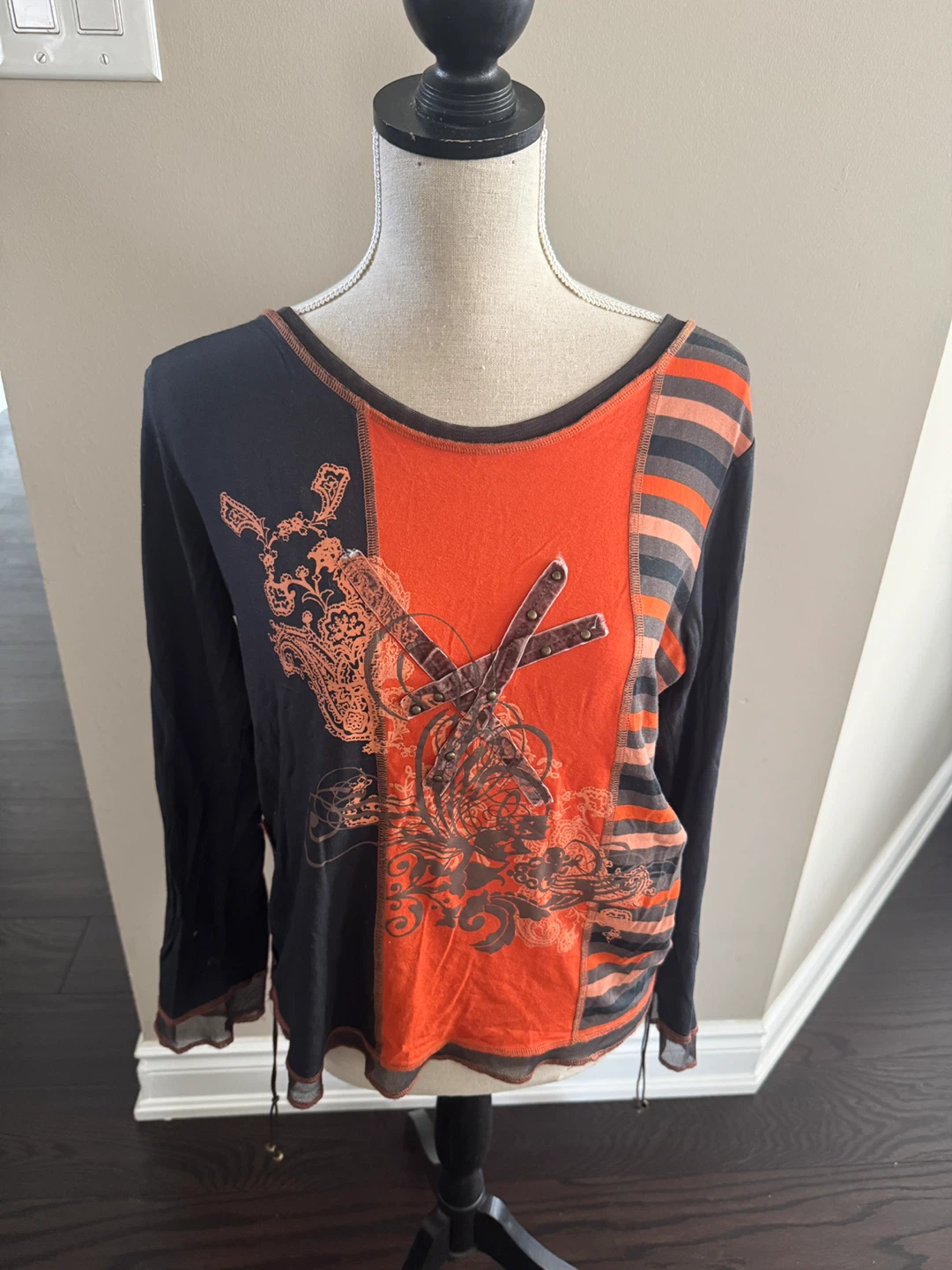 Long Sleeve Graphic Top fits like medium