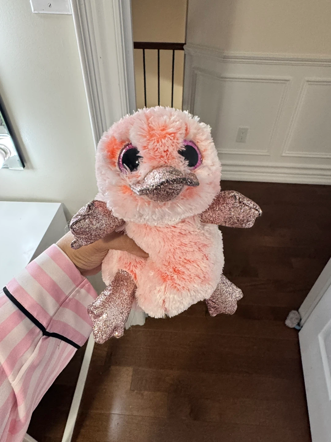 Pink sparkly stuffed platypus toy