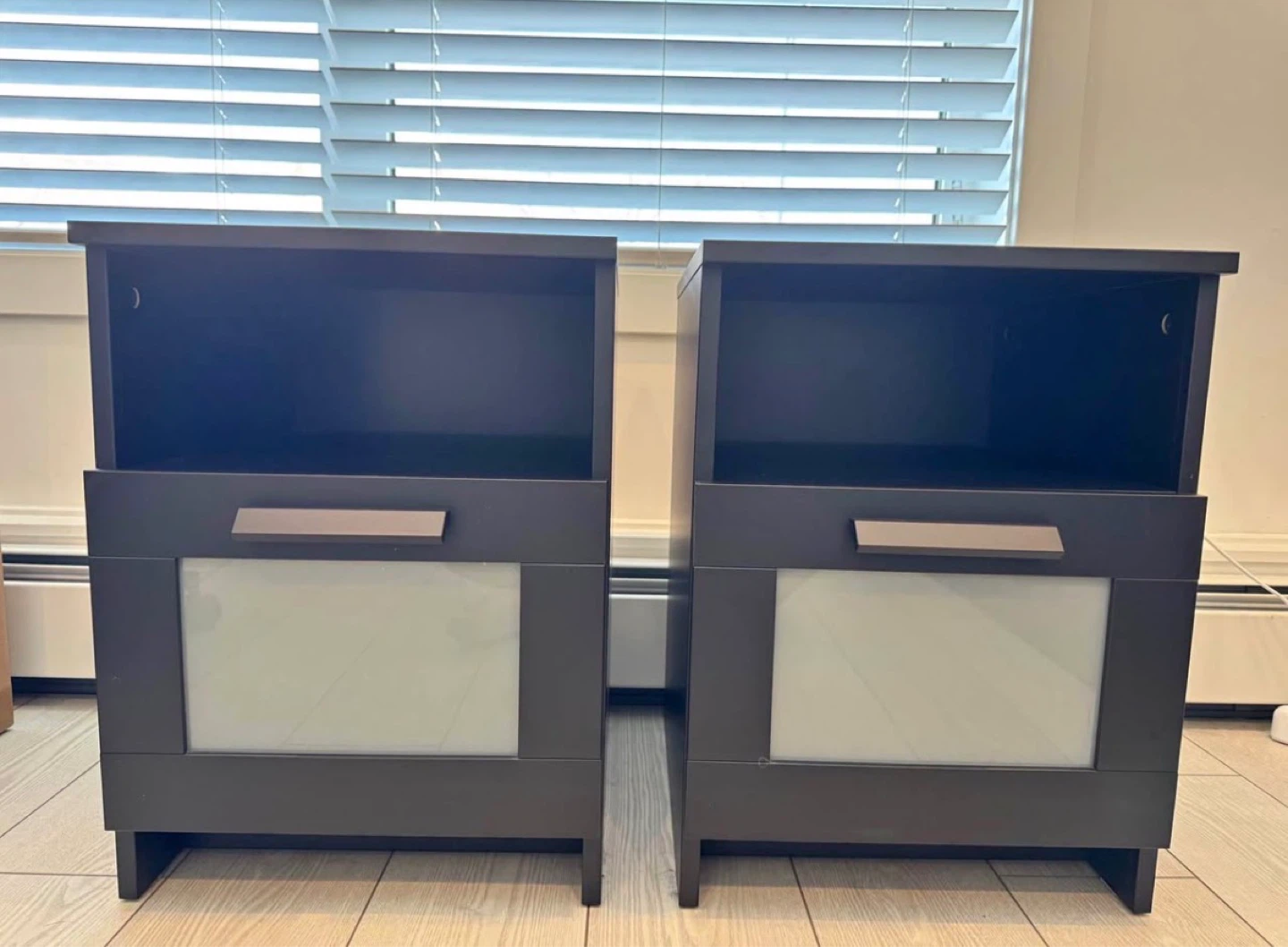 pair of IKEA nightstands in black