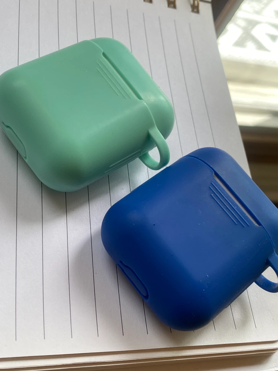 Two pairs: Apple AirPods 2nd Gen with Charging Case