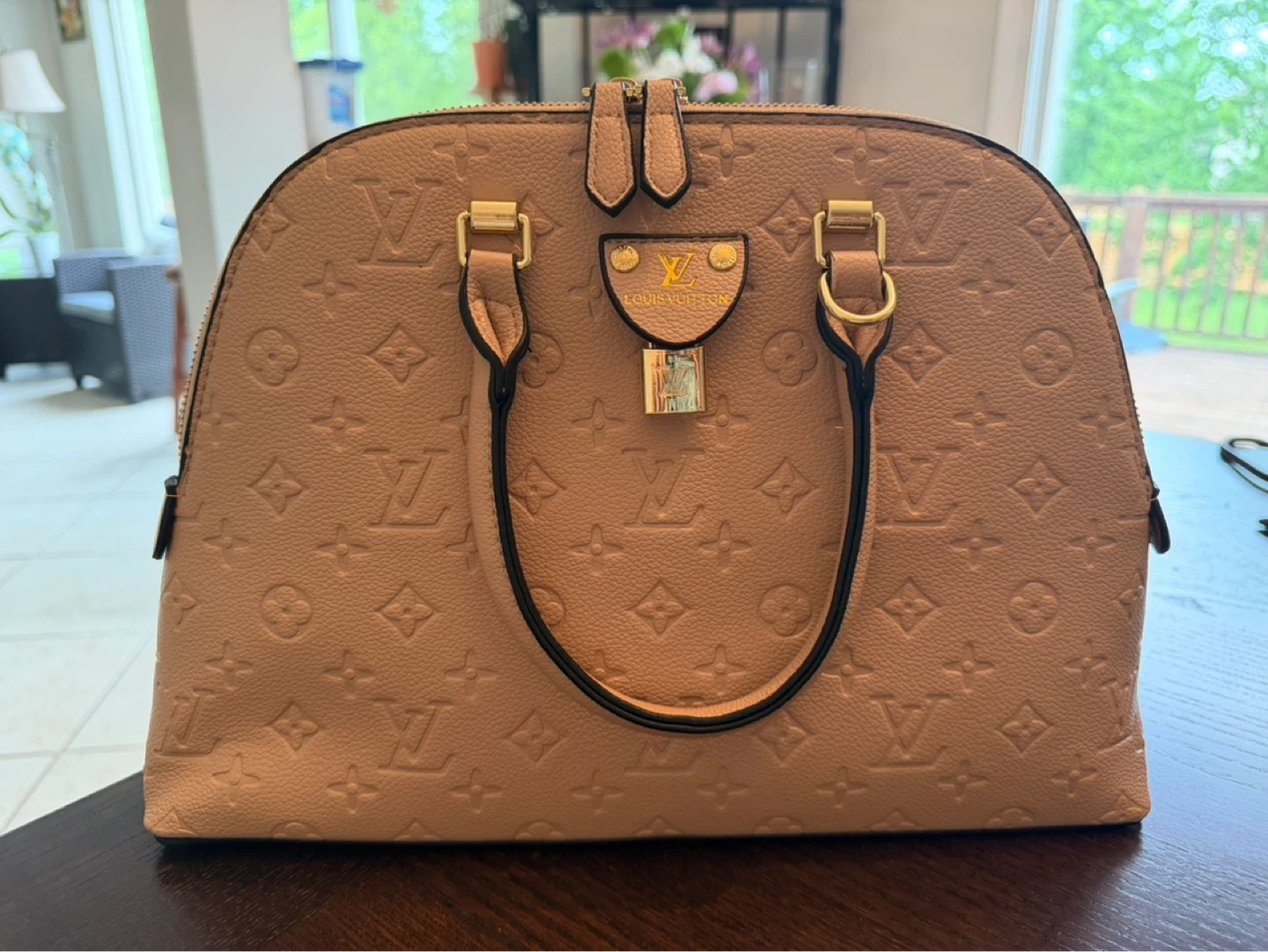 Alma PM Monogram Embossed Leather Handbag