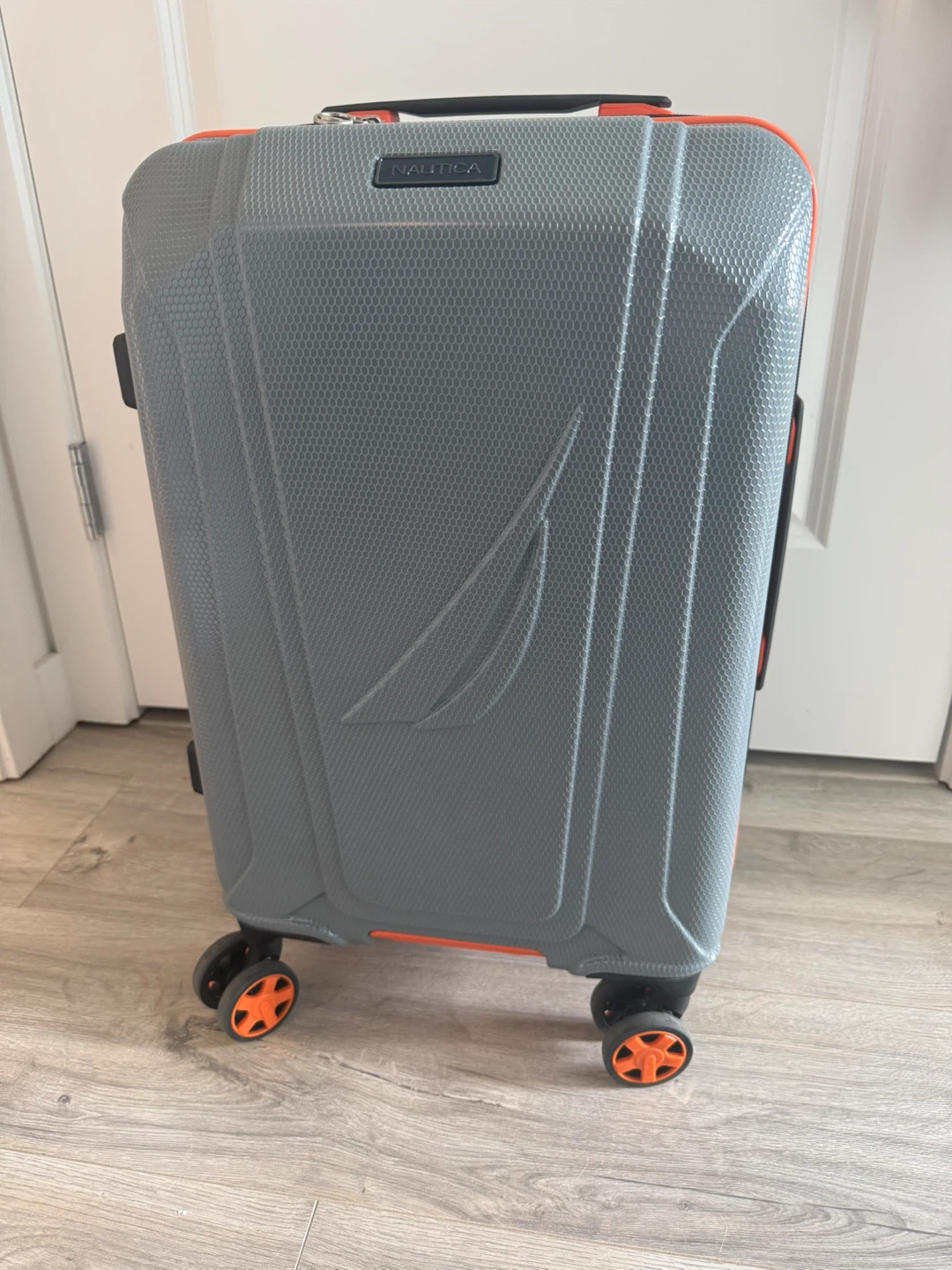 Nautica Grey Hardside  Carey On Luggage with Orange Accents