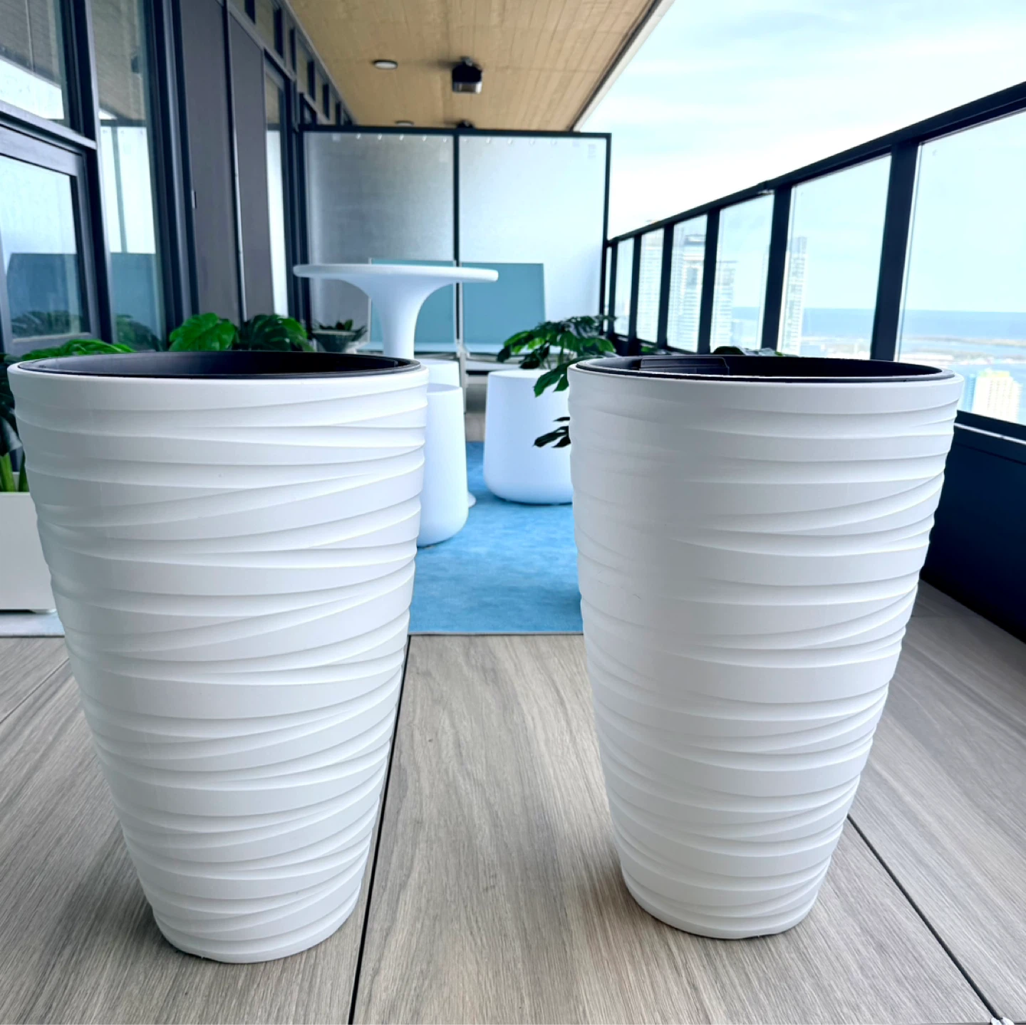 Two tall white planters, like new
