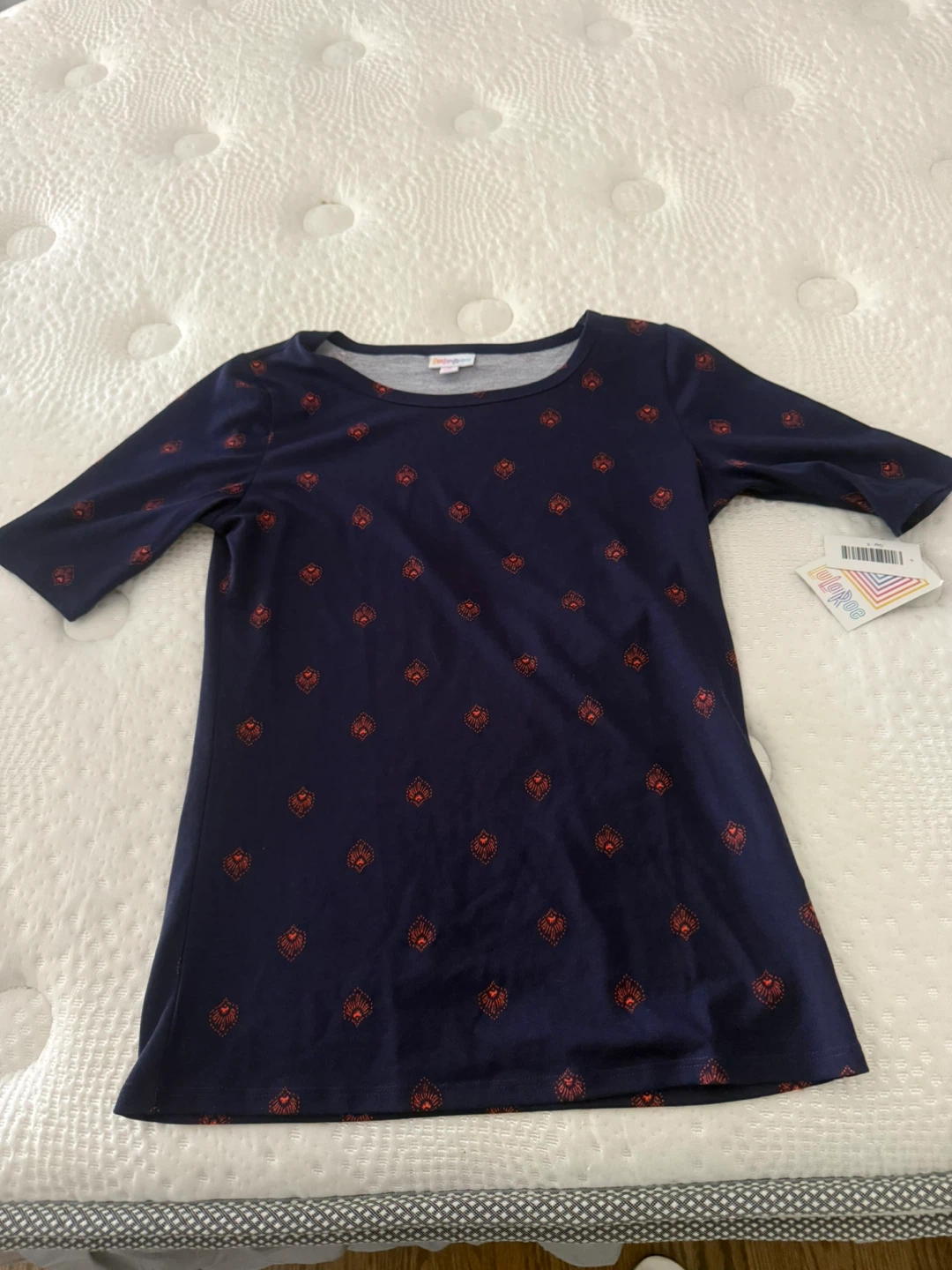 LuLaRoe Navy Blue Printed shirt Size S