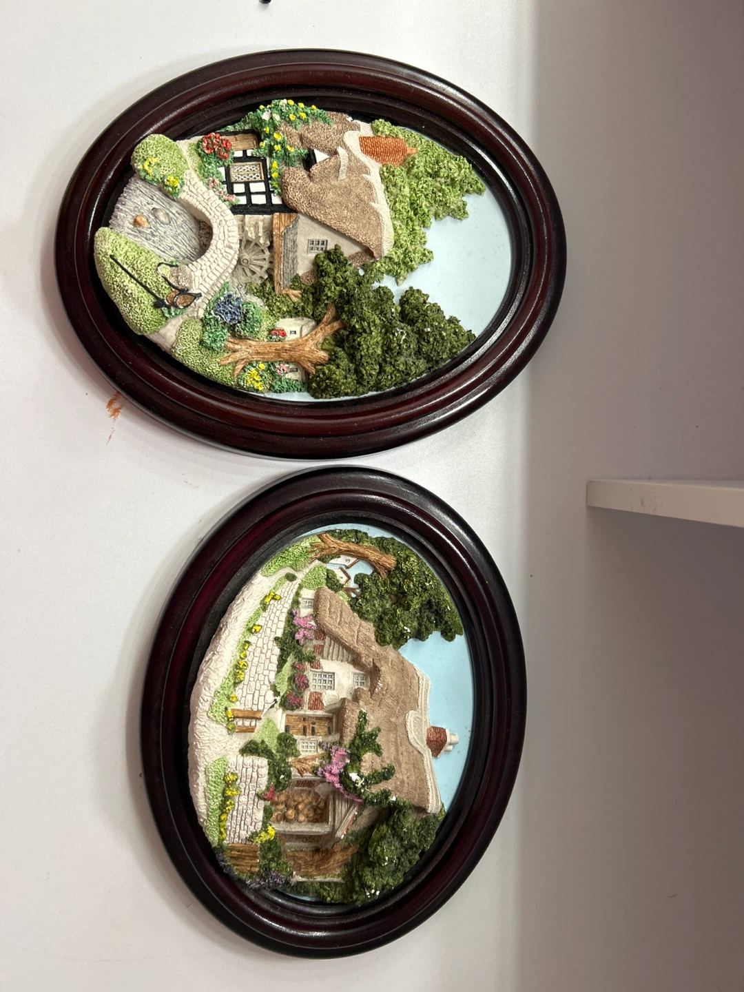 Oval Framed Cottage Scene Wall Art