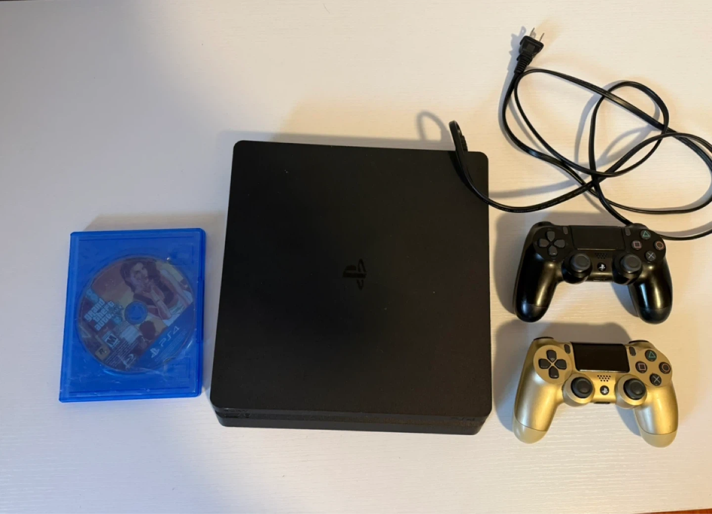 Sony PlayStation 4 Slim with 2 Controllers and Game