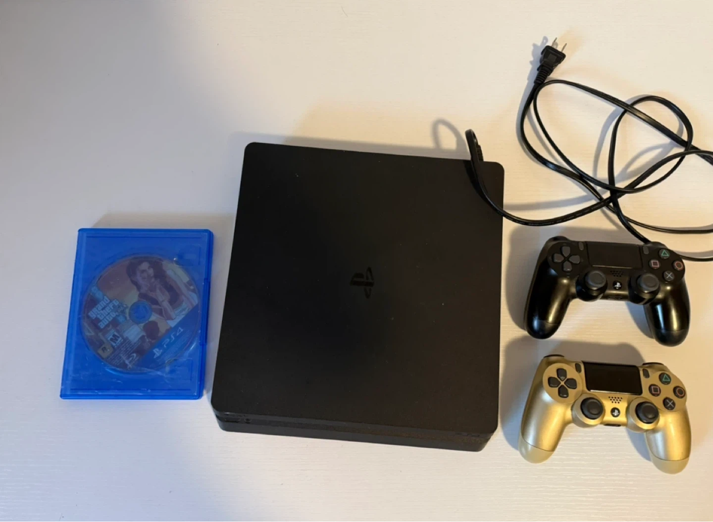 Sony PlayStation 4 Slim with 2 Controllers and Game - photo 2