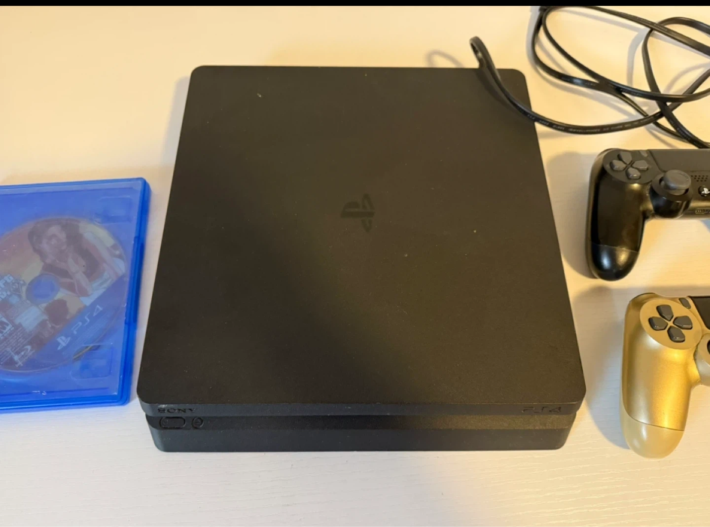 Sony PlayStation 4 Slim with 2 Controllers and Game - photo 3