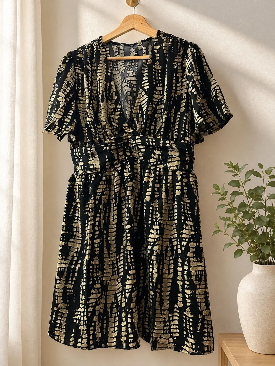 Black and gold tie-dye print midi dress