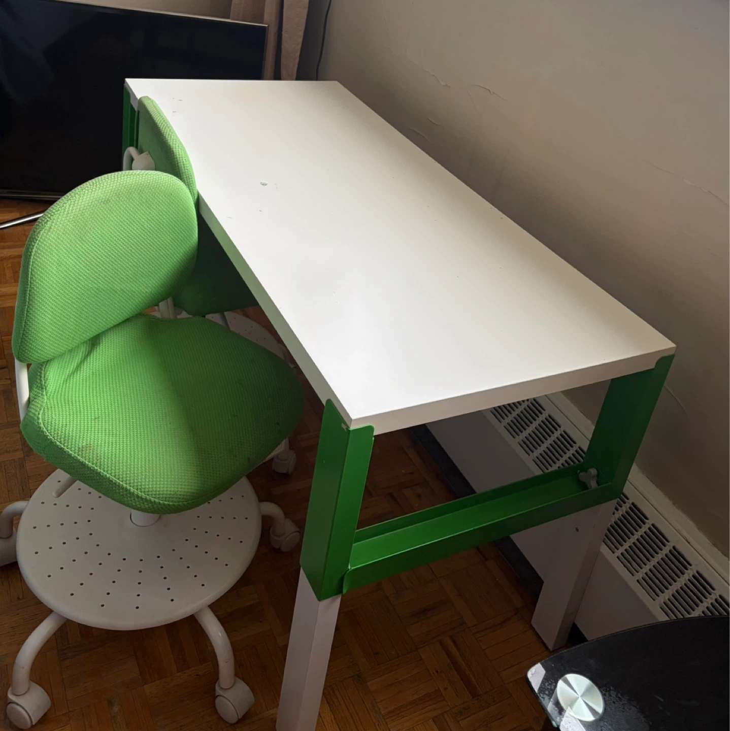 White desk with green trim and two green chairs - photo 4