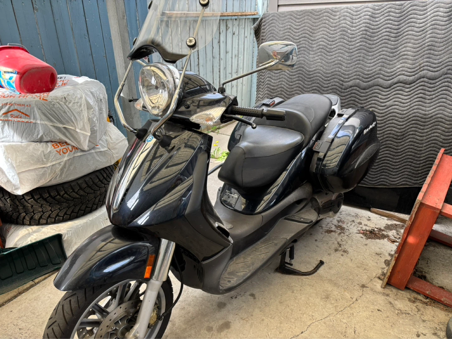 Black Piaggio Beverly Scooter