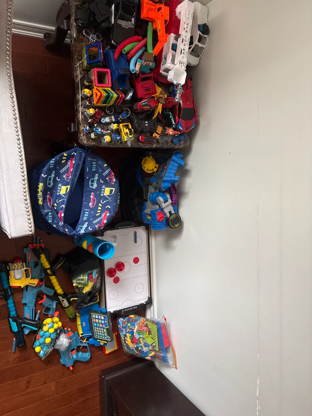 Assorted Toy Bundle: Nerf Guns, LEGO, Air Hockey & More