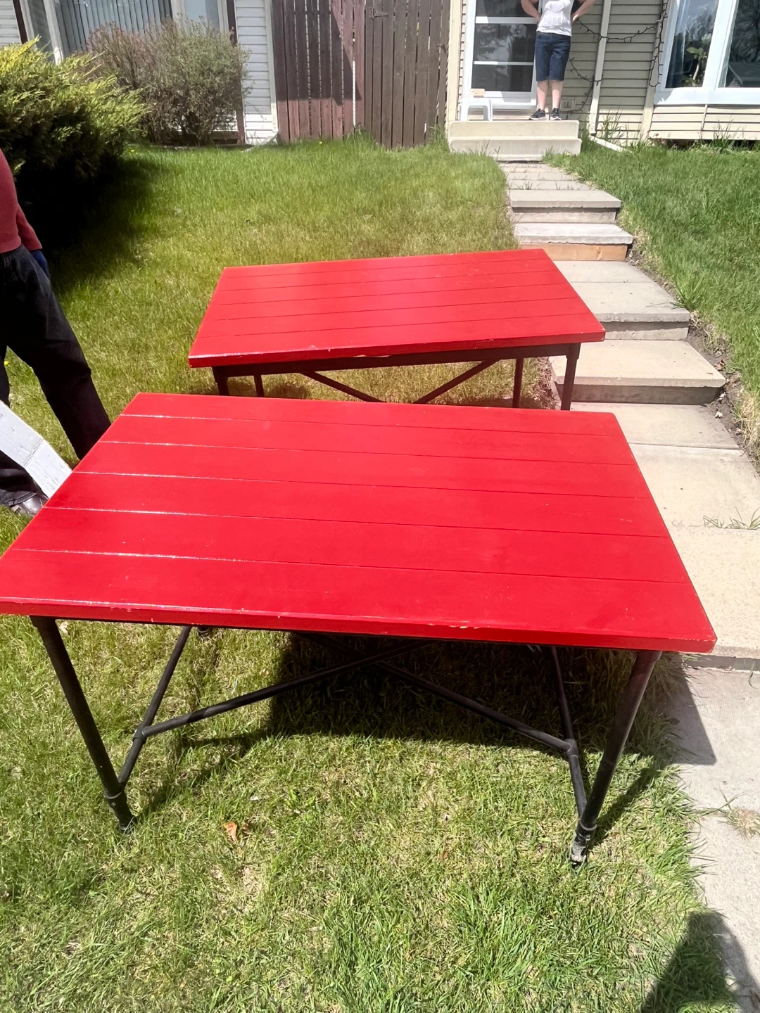 Two Red Outdoor Tables