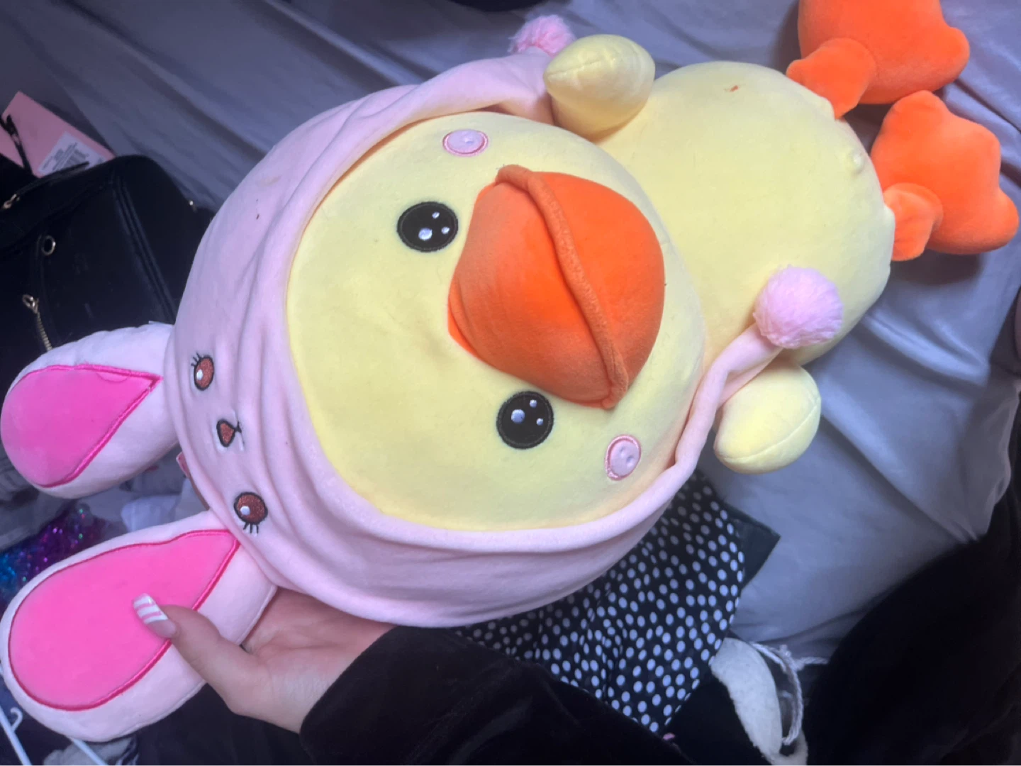 Peluche canard jaune avec bonnet rose
