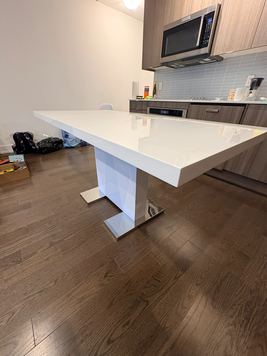 White Extendable Dining Table with Pedestal Base
