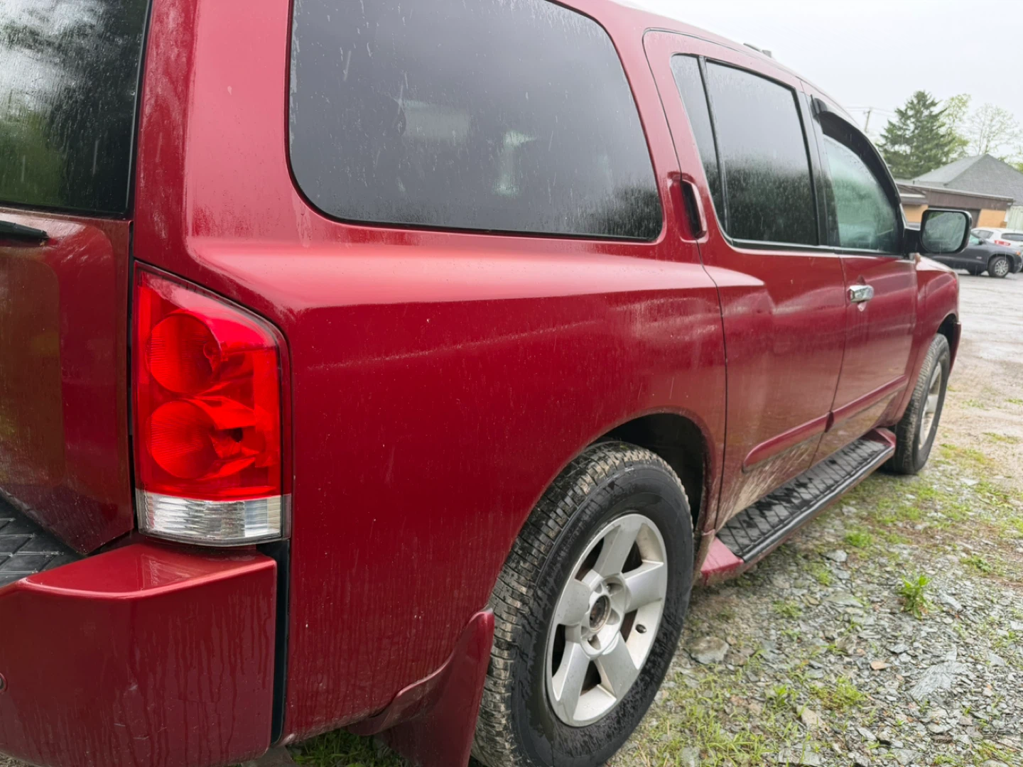 Red Nissan Armada SUV 2006 millas 170.00 milla