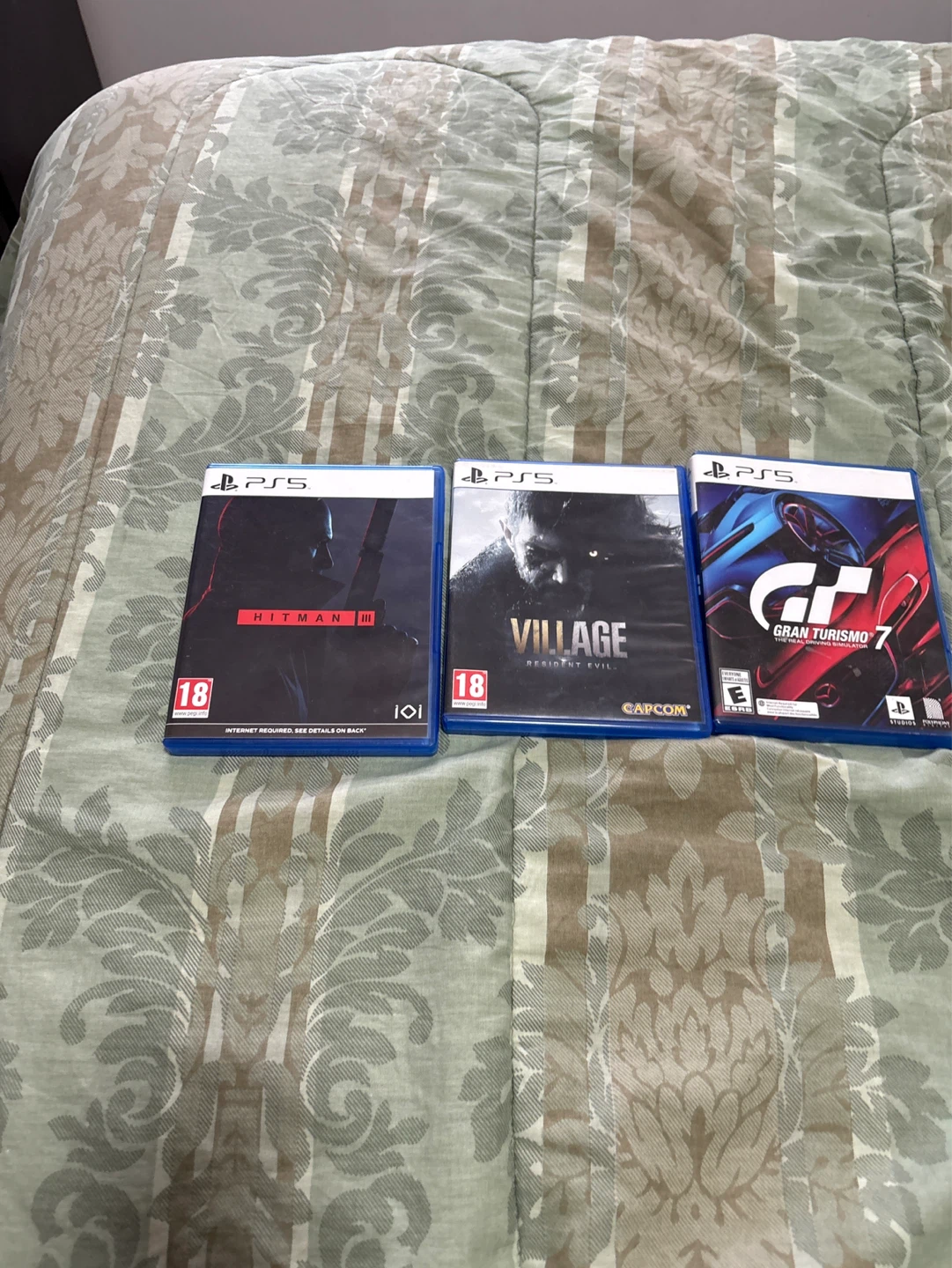 PS5 games- Hitman III, Resident Evil Village, Gran Turismo 7