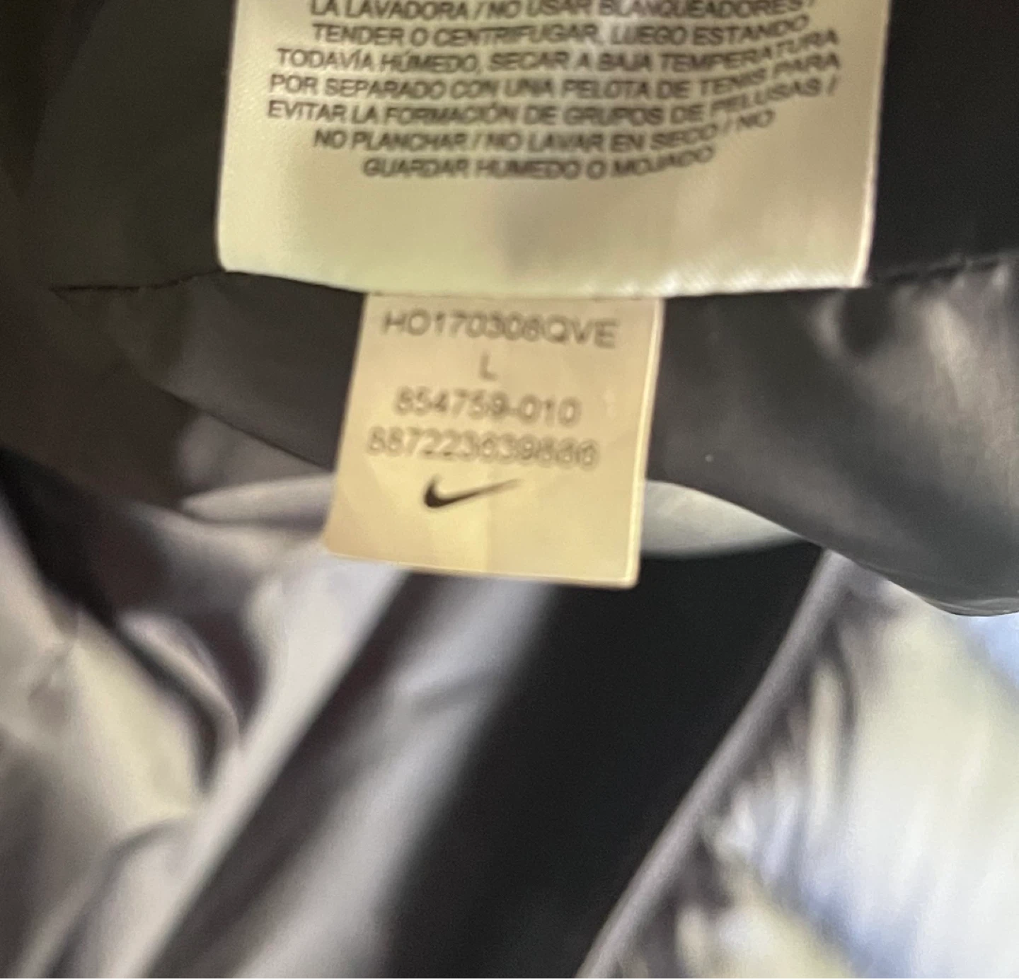 Nike Down Hooded Asymmetrical Zip Puffer Jacket in Black Size Lg - photo 4