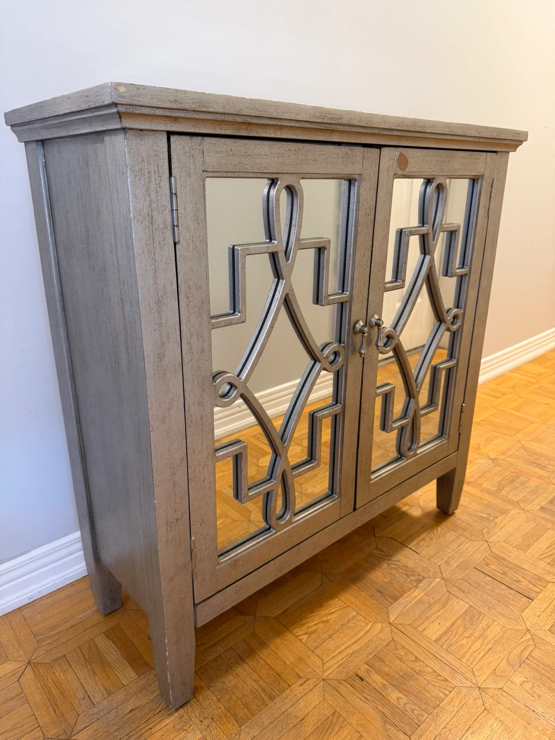 Mirrored Cabinet with Geometric Design