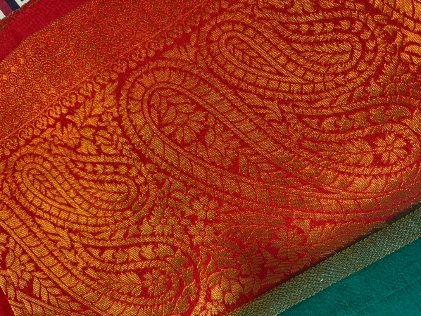 Teal and Orange Saree with Gold Paisley Design
