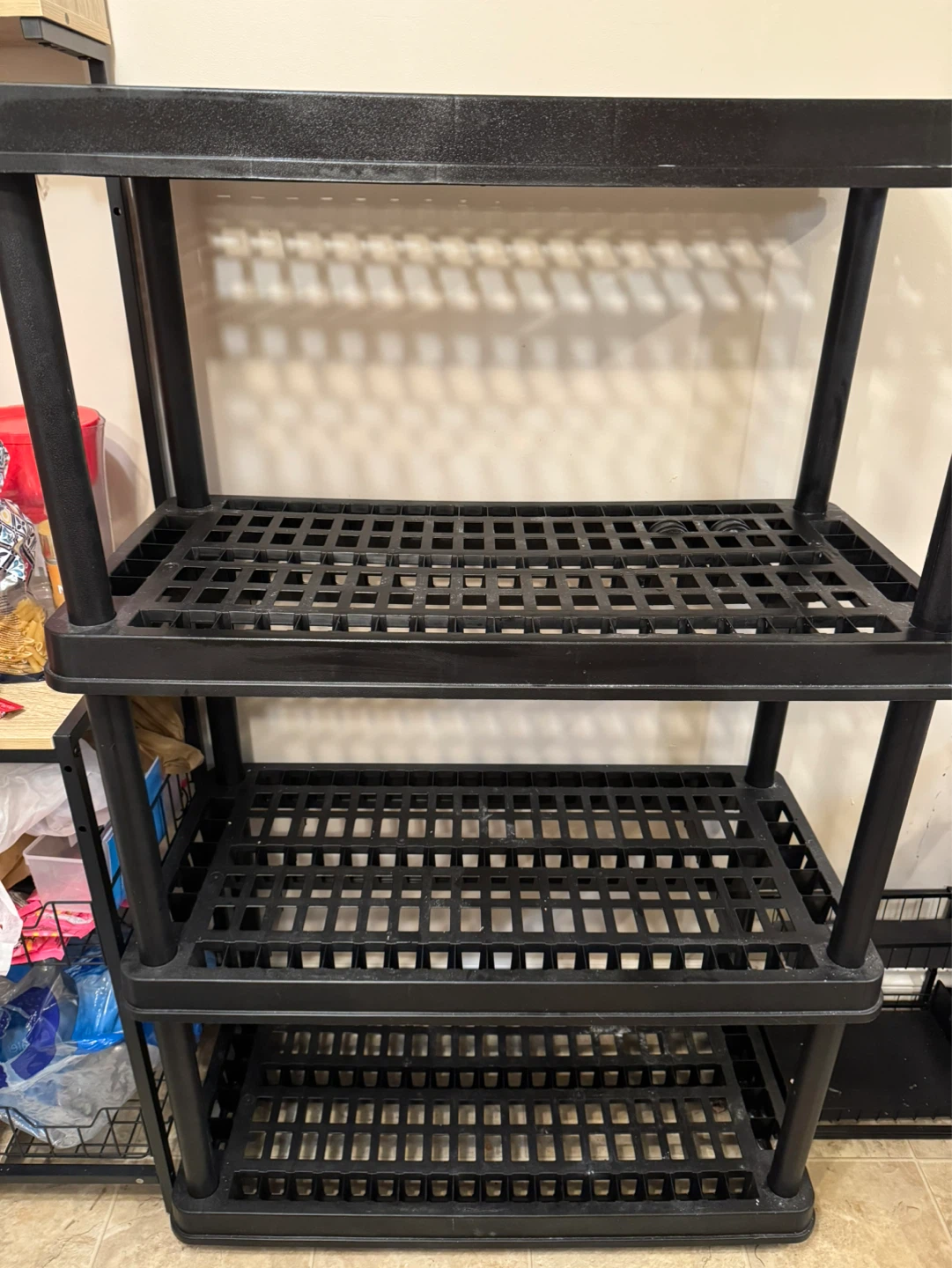 TuffStore 4-Shelf Resin Plastic Storage Rack.