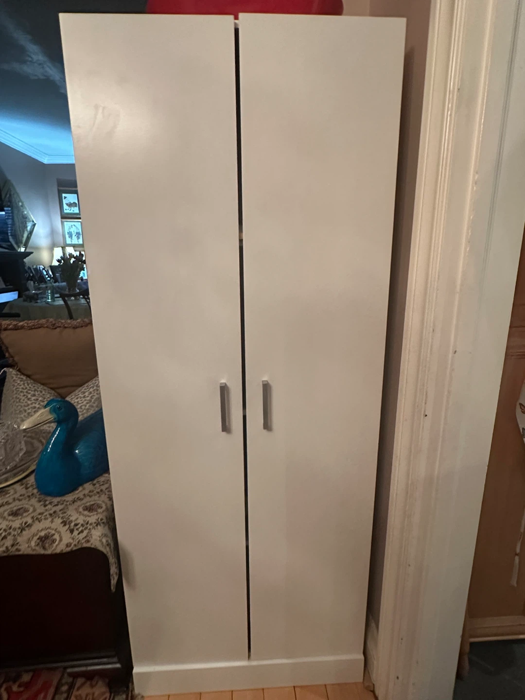 White Storage Cabinet with Decorative Door Panel