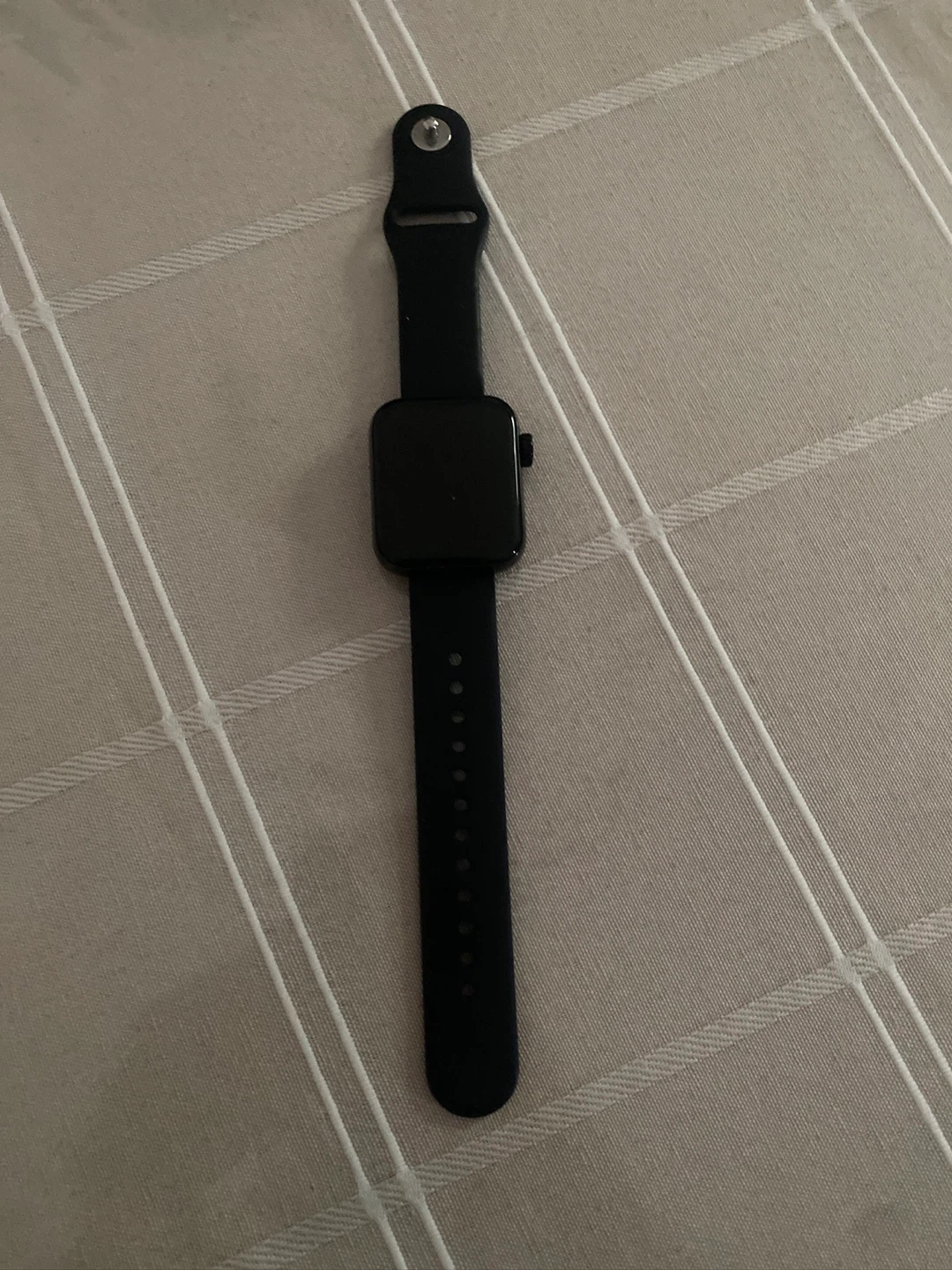 Black Smartwatch with Charging Cable