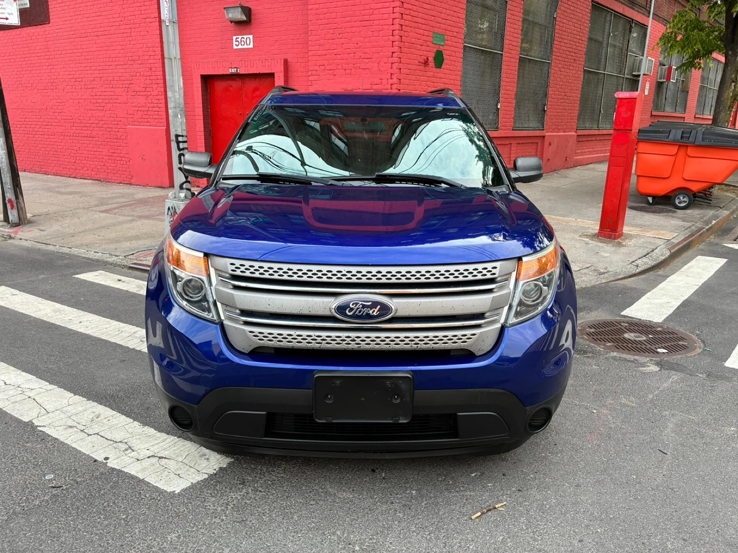 Blue Ford Explorer SUV - photo 2