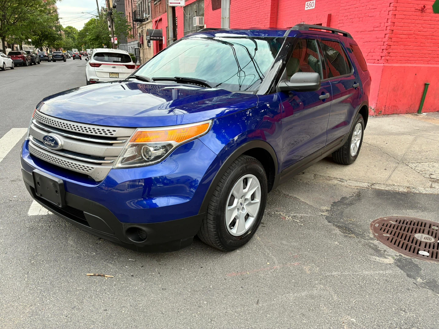Blue Ford Explorer SUV - photo 3