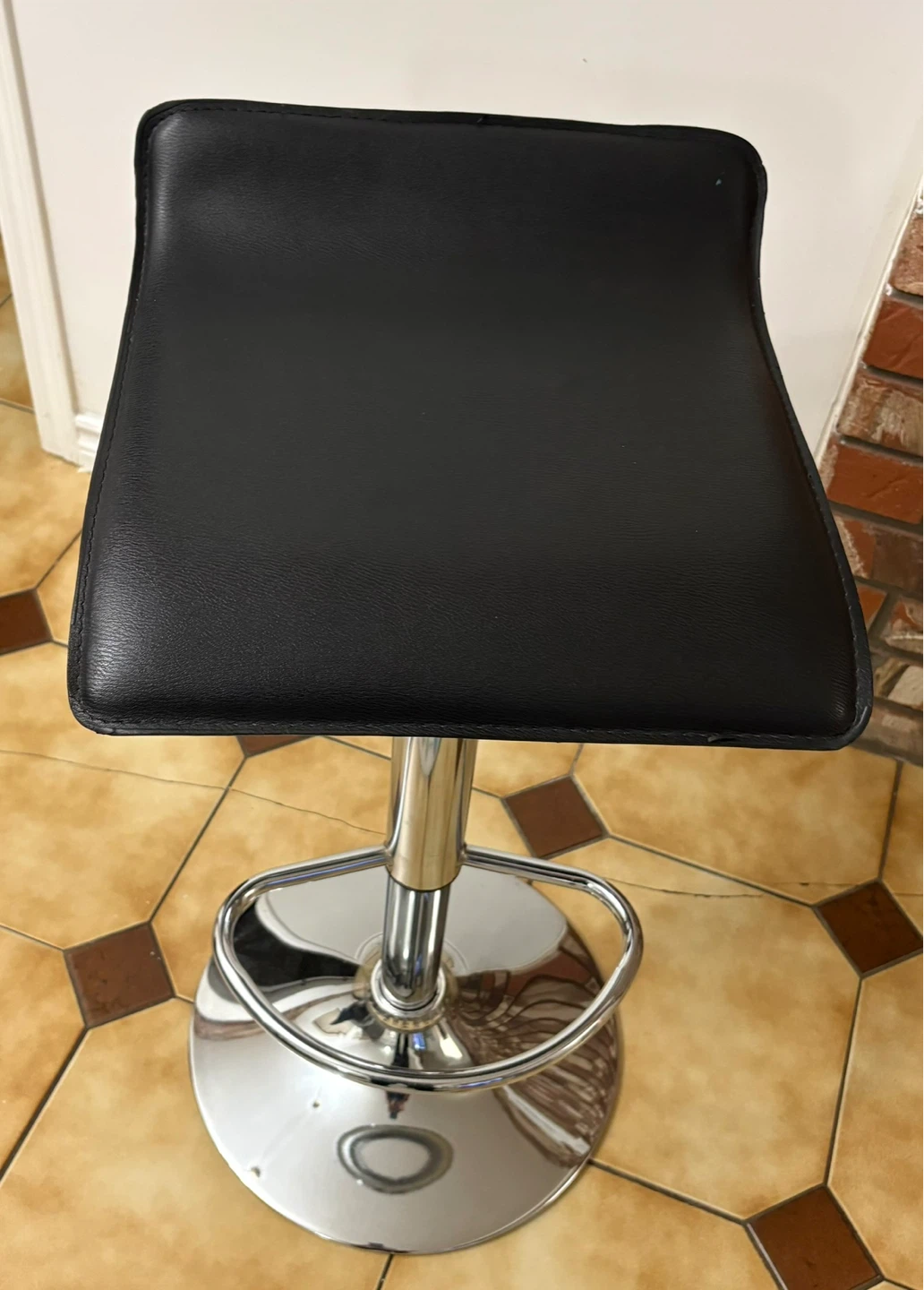 Adjustable black bar stool