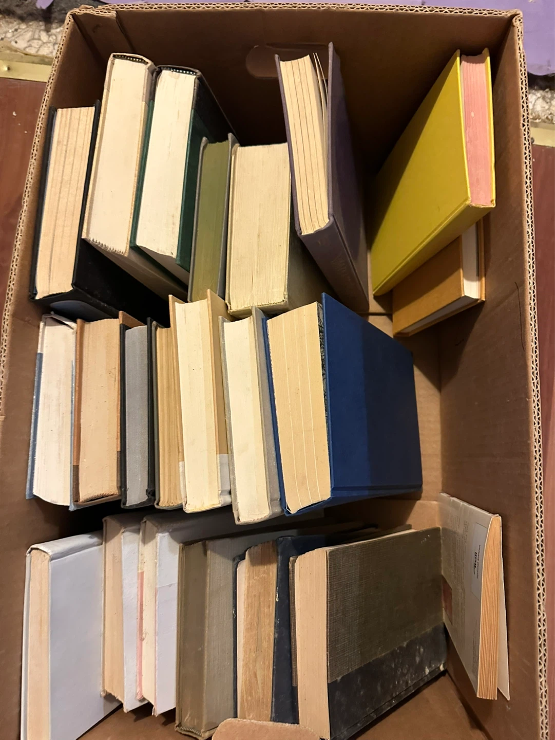 Box of assorted books