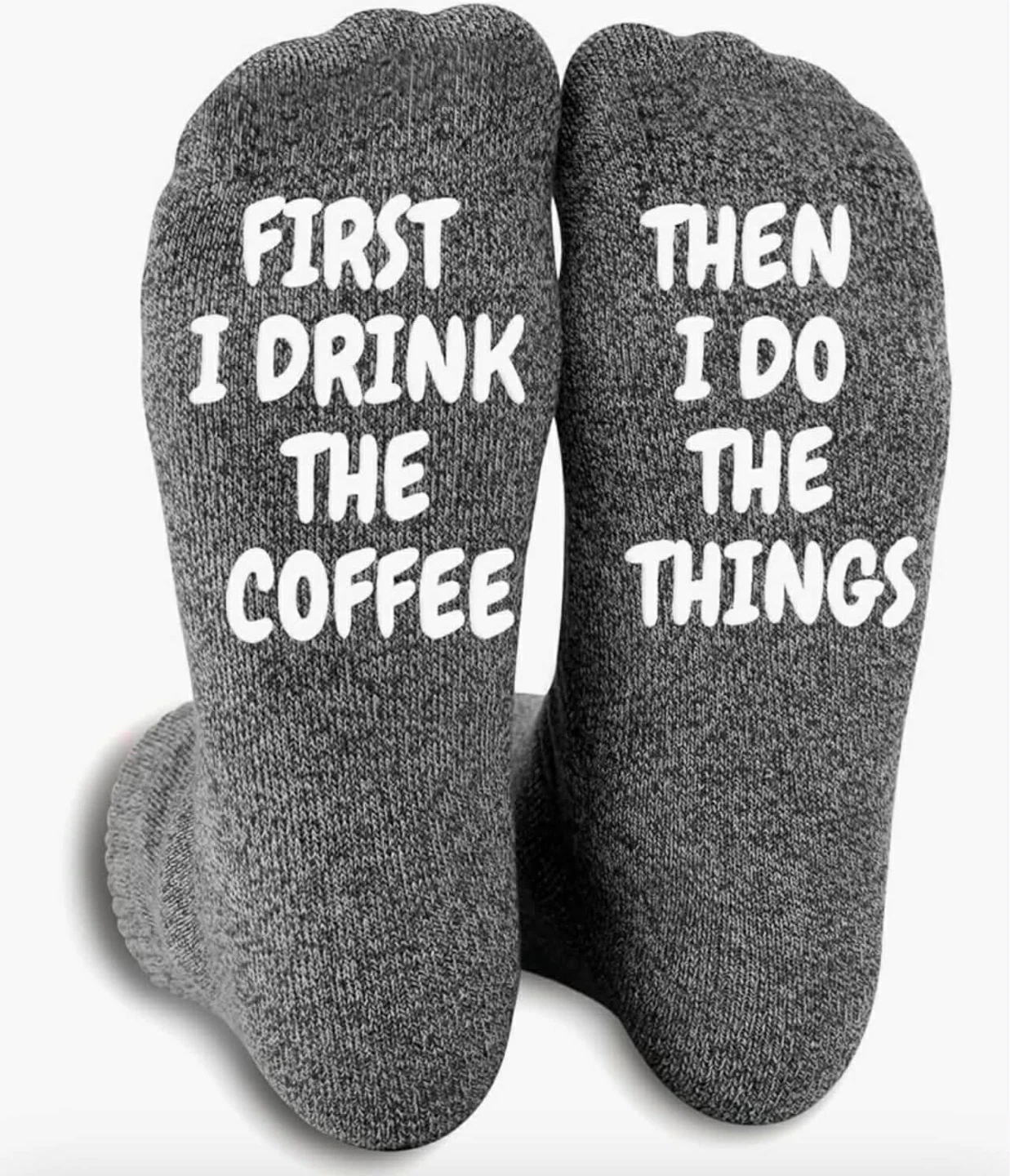 Fun socks,  “First I drink the coffee”?