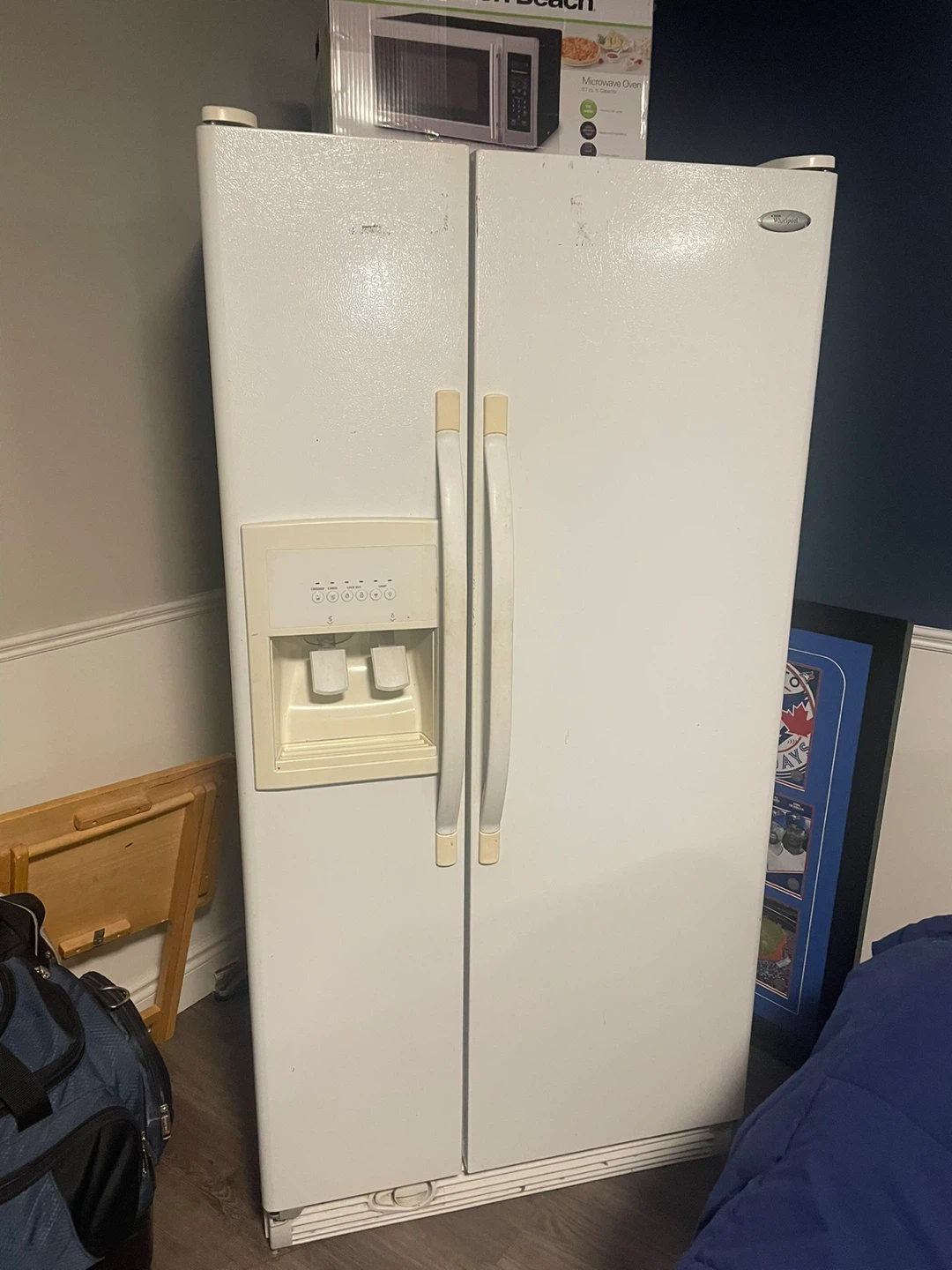 Whirlpool Side-by-Side Refrigerator with Water/Ice Dispenser