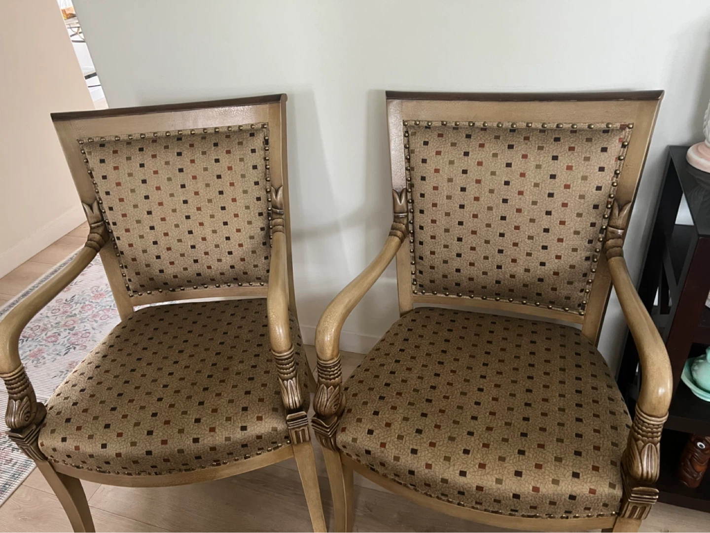 Two accent chairs with patterned upholstery