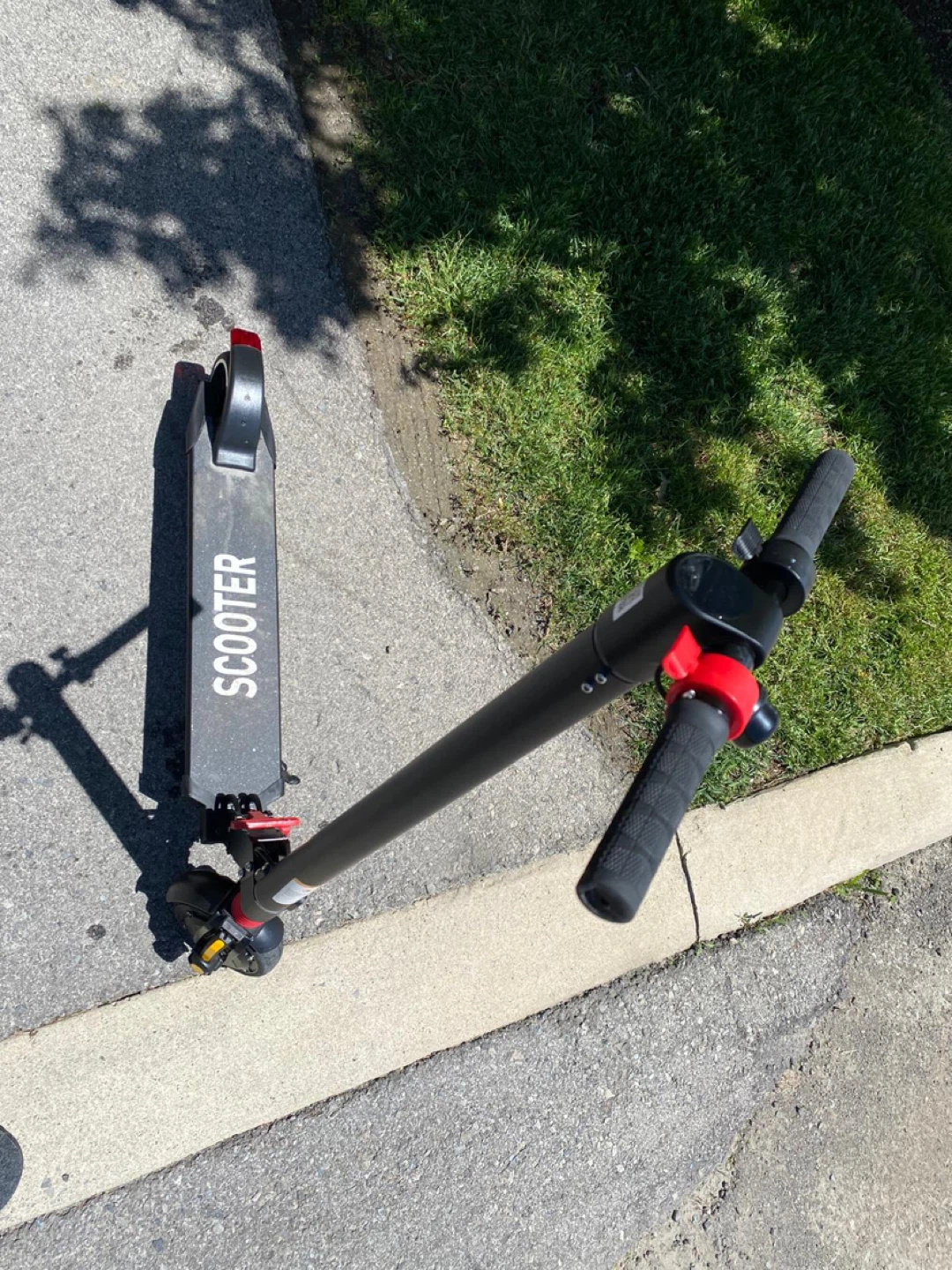 Black Electric Scooter with Charger