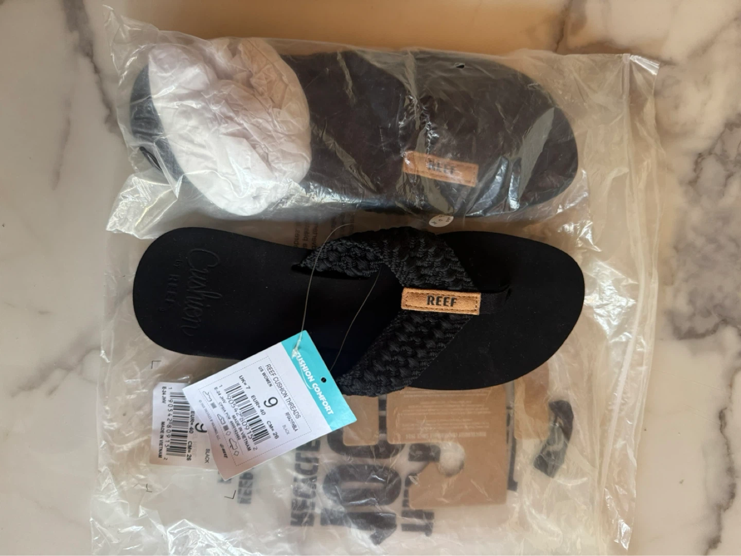 Reef Cushion flip flops