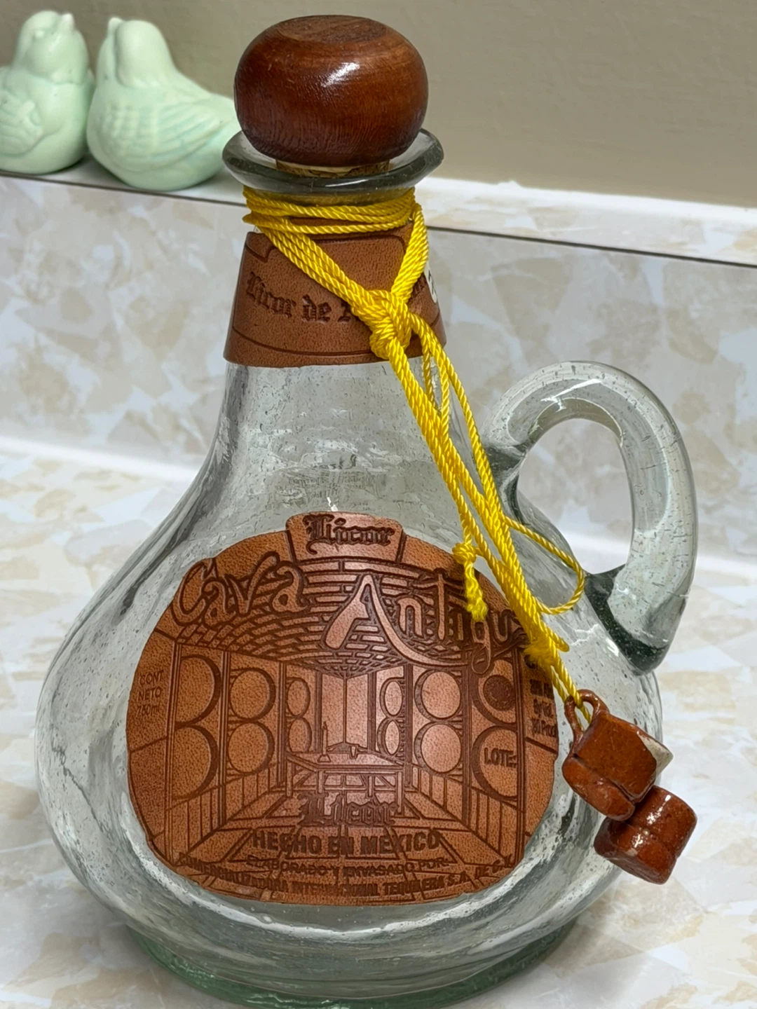 Cava de Oro Añejo Tequila Bottle