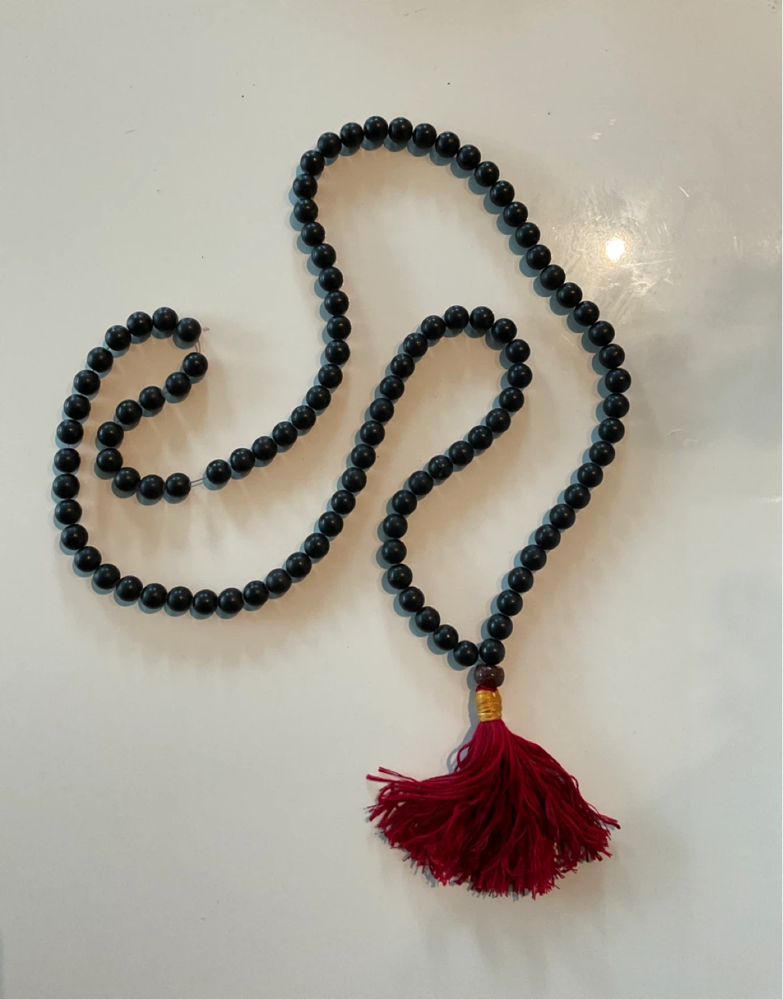 Buddhist prayer (malas) black beads with red tassel