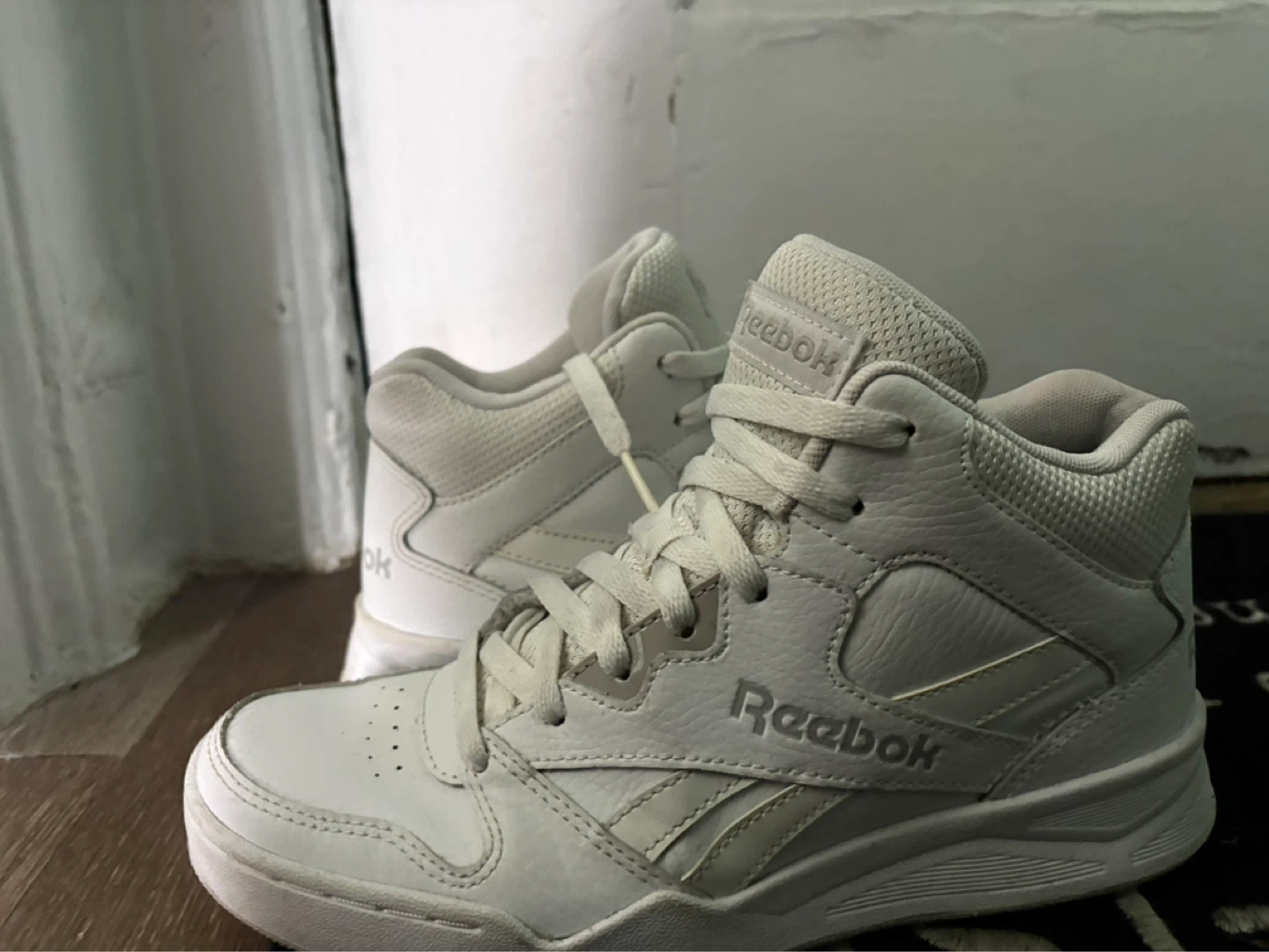 Reebok White Mid Top Sneakers