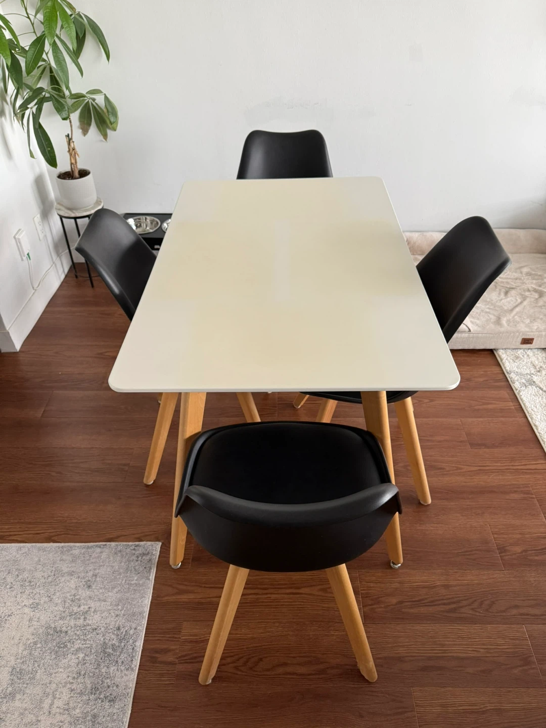White Dining Table with 4 Black Chairs