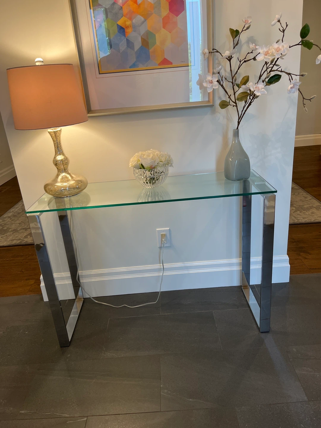 Glass top console table with chrome legs